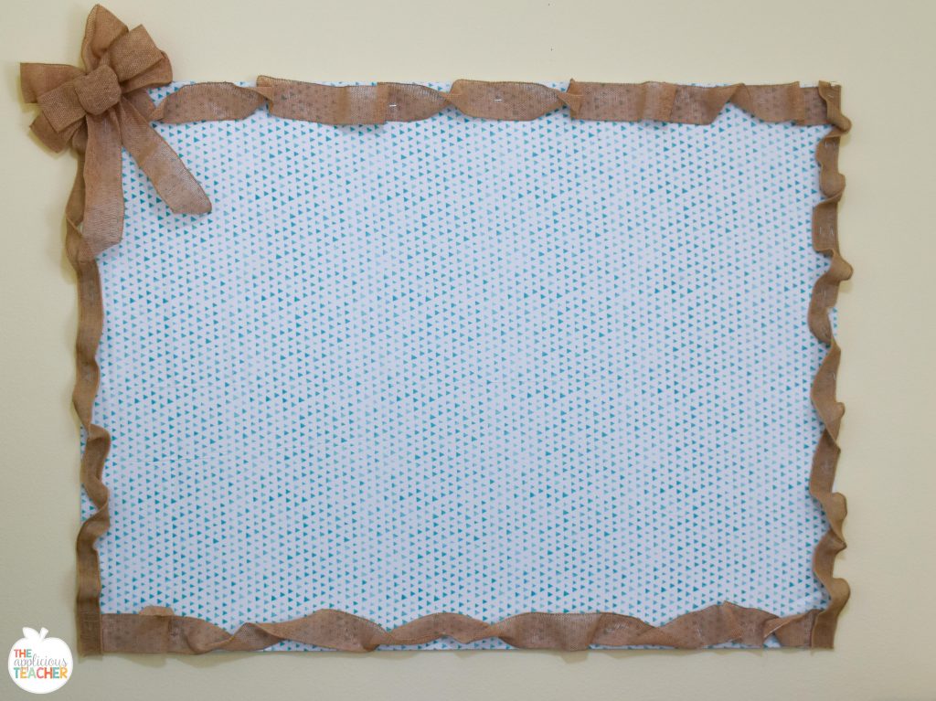 Homemade bulletin board using foam board and command strips. 