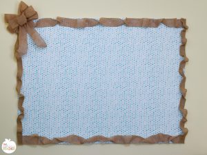 Homemade bulletin board using foam board and command strips.