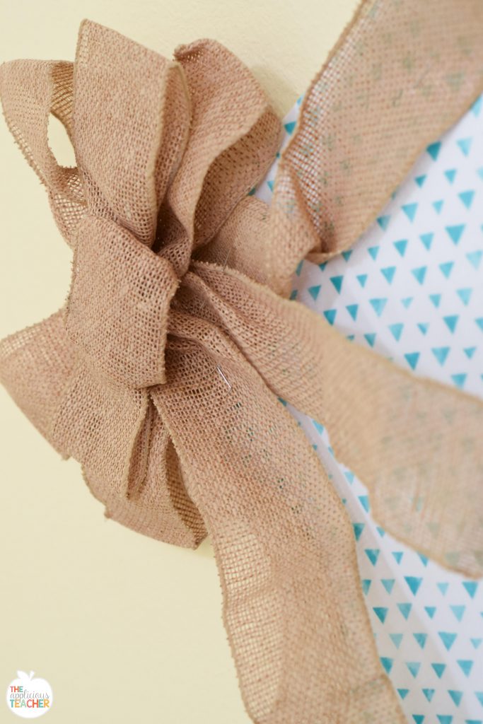 Burlap bow on bulletin board